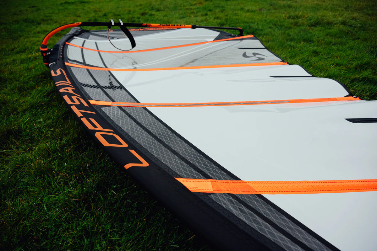 Side-Alternating X-Ply Batten Pockets